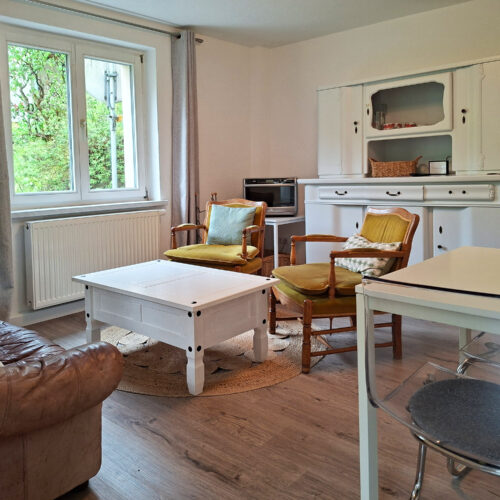 Wohnung Farn - Wohnzimmer mit gemütlicher Sitzecke